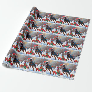 Doberman Running in Snow with Christmas Hat Wrapping Paper