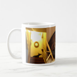 Doberman with puppy coffee mug