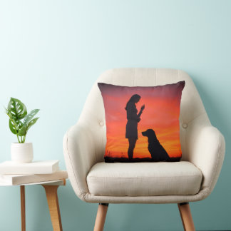 dog and girl Throw Pillows