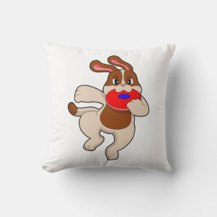 Dog at Playing Cushion