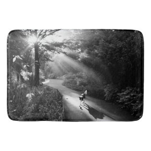 Dog in morning sunlight bath mat