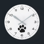 Dog Paw Print with Hours and Minutes Round Clock<br><div class="desc">A fun wall clock for the home or office. Makes an original gift for dog lovers. Check out Jenn’s Doodle World for even more decorative clocks and dog breed themed home decor.</div>