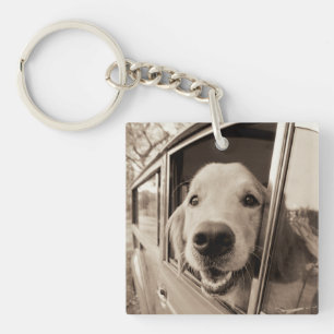 Dog Peeking Out a Car Window Key Ring