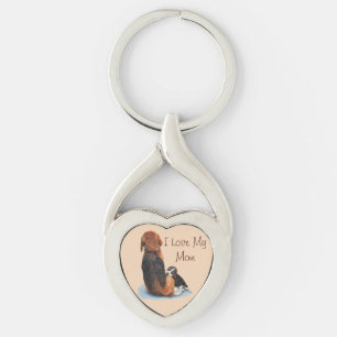 dog picture of cute puppy cuddling mum key ring