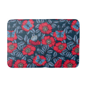 Dog rose and butterflies in blue and red bath mat