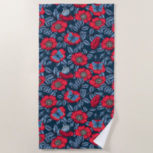 Dog rose and butterflies in blue and red beach towel