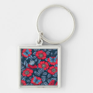 Dog rose and butterflies in blue and red key ring