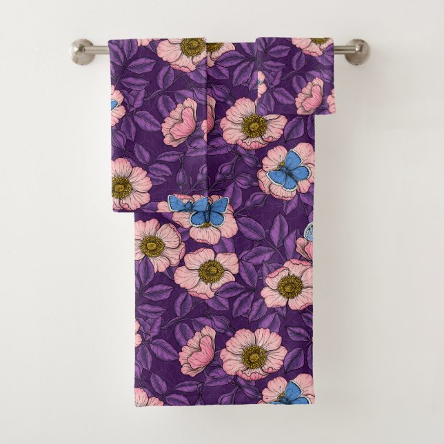 Dog rose and butterflies in pink and purple bath towel set (Insitu)