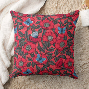 Dog rose and butterflies in red and blue cushion