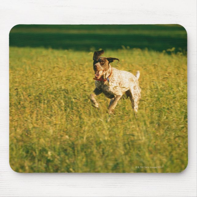 Dog running through grass mouse mat (Front)
