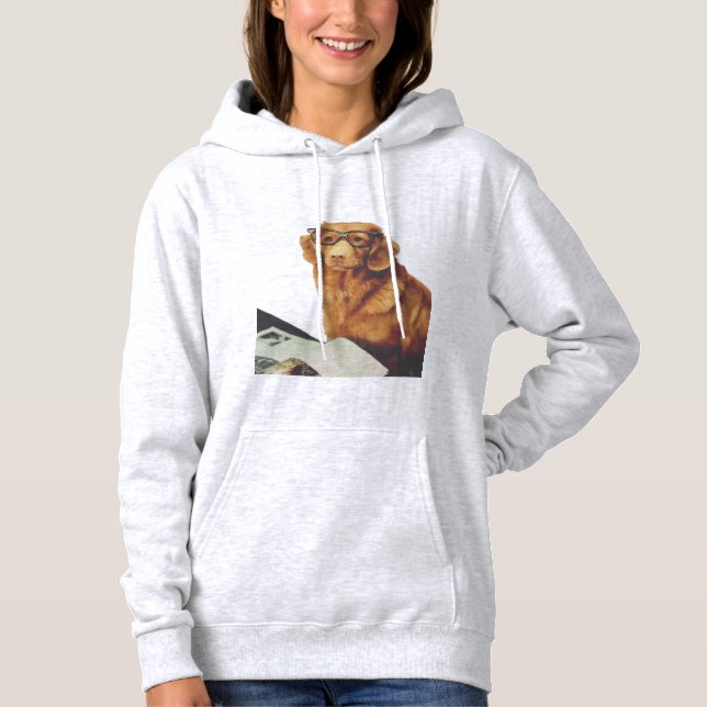 Dog sitting in front of a magazine  hoodie (Front)