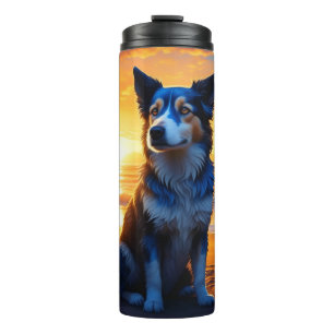 Dog sitting on Ocean Beach at Sunset Thermal Tumbler
