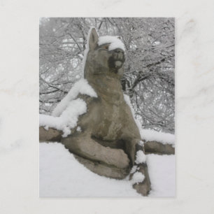 dog statue in snow postcard