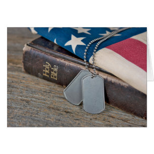 Dog tags on Bible