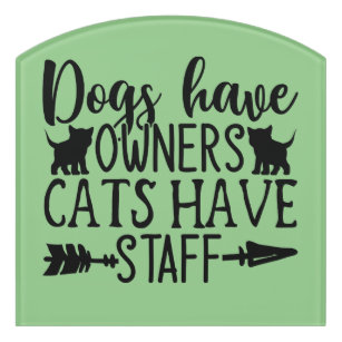 Dogs have owners cats have staff door sign