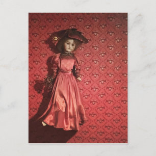 doll on a wall postcard