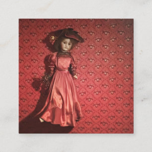 doll on a wall square business card