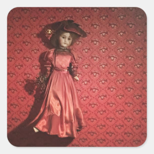 doll on a wall square sticker