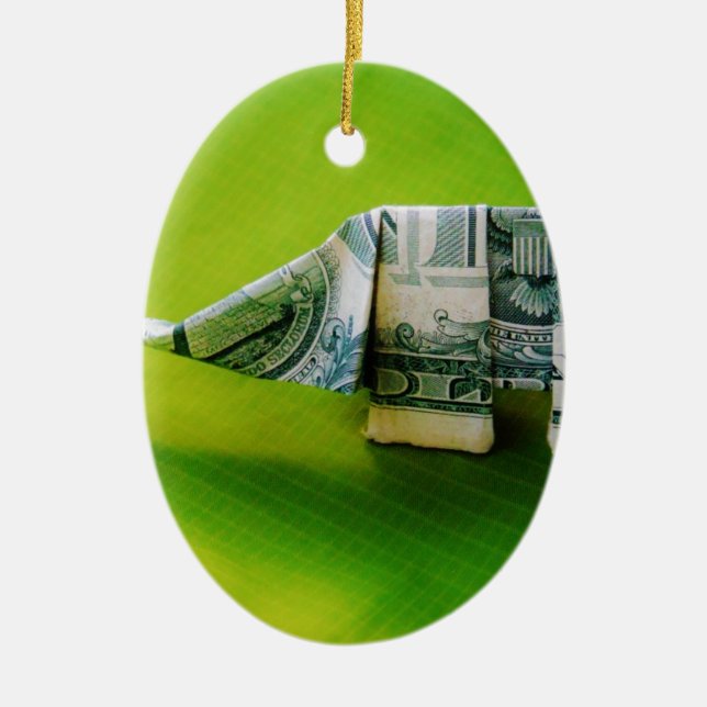 Dollar bill origami Elephant on Green background Ceramic Tree Decoration (Front)