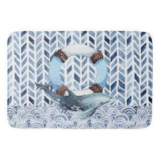 Dolphin and lifebuoy on maritime pattern bath mat