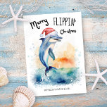 Dolphin Santa Merry Flippin' Christmas Beach Holiday Card<br><div class="desc">Share some holiday humour and your "Merry Flippin' Christmas" greetings with this nautical watercolor card featuring a happy dolphin in a Santa hat flipping its tail and splashing in the sea. Perfect for those who love the beach and ocean creatures. Art by KL Stock</div>