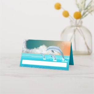 dolphins breaching in the ocean place card