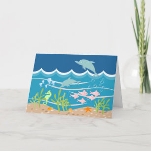 Dolphins swiming under the sea card