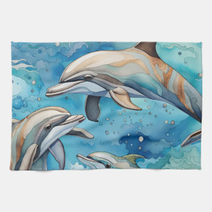 Dolphins swimming in the sea tea towel