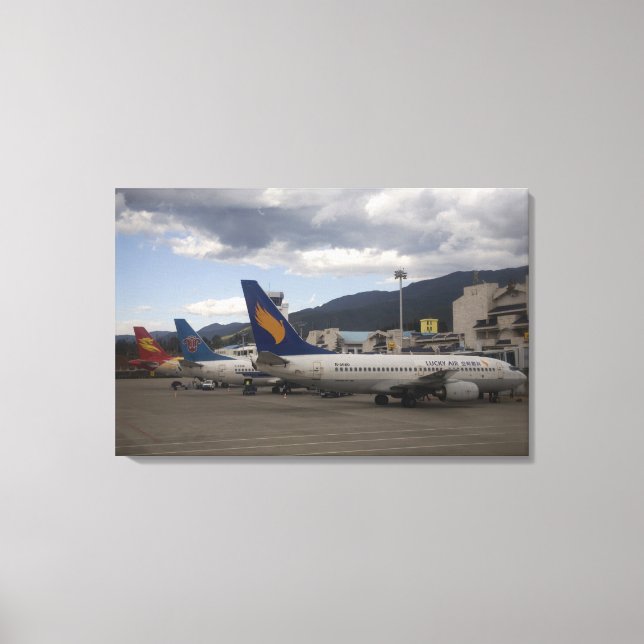 Domestic Chinese jet airliners lined up at Canvas Print (Front)