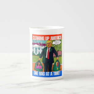 DONALD TRUMP - CLEANING UP AMERICA, ONE BAG A TIME BONE CHINA MUG