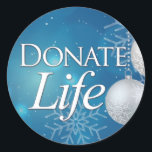 Donate Life with Ornaments & Snowflakes Classic Round Sticker<br><div class="desc">This wintry Donate Life sticker will add an extra sparkle to your holiday packages, tissue paper or Christmas envelopes. It's also a great way to promote donor awareness during the holiest time of year. It's the season of giving... give the Gift of Life. Donate Life. Transplant Recipients, Donor Families and...</div>