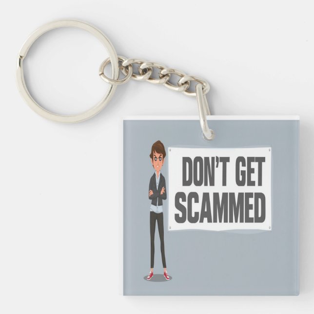 Don't Get Scammed Banner Next To A Scammer Key Ring (Front)