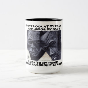 DON'T LOOK AT MY FACE, AND JUDGE MY RACE Two-Tone COFFEE MUG