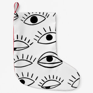 Doodle eye, creative seamless pattern. small christmas stocking