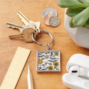 Doodle flowers and leaves in yellow and black key ring