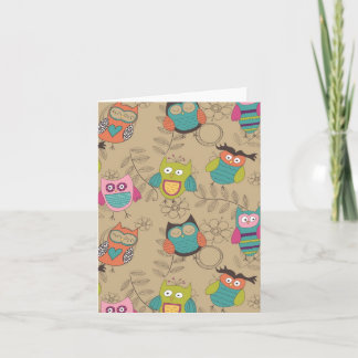 Doodled owls on beige background card