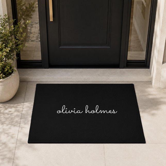 Doormat | Custom Black Script Name Welcome Mat (Personalized black script doormat with custom family name for a modern front porch welcome.)