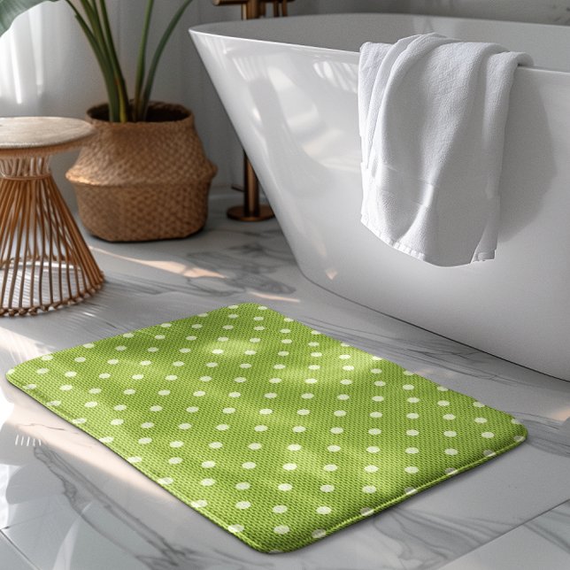 Dotty Delight Green Bath Mat (A Dotty Delight Green Bath Mat on the floor. )