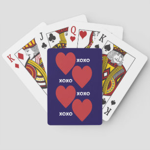 Double red heart and xoxo pattern on blue playing cards
