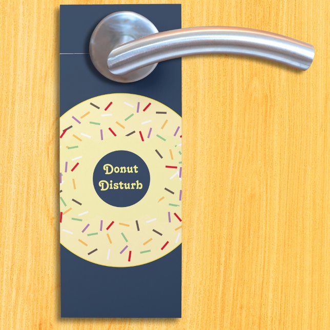 Doughnut Disturb Please Knock 2-Sided Funny Doughn Door Hanger (A donut image door handle sign with 'Donut Disturb' message on one side, 'Please Knock' on the other)