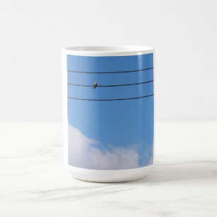Dove on the wire coffee mug