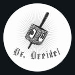 DR. DREIDEL CLASSIC ROUND STICKER<br><div class="desc">Holiday Humour, LGBTQ Designs and Funny Christmas Gifts From LGBTShirts.com Shop for Everyone at LGBTshirts.com - Browse over 10, 000 LGBTQ Gifts, Holiday Humour, Equality, Slang, & Culture Designs. The Most Unique Gay, Lesbian Bi, Trans, Queer, and Intersexed Apparel on the web. SHOP MORE LGBTQ Designs and Gifts at: http://www.LgbtShirts.com...</div>