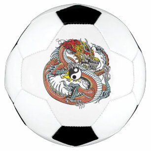 dragon holding yin yang football
