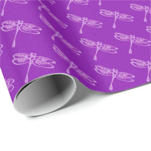 Dragonflies, pale orchid on deep purple wrapping paper