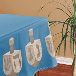 Dreidel Rustic Oak Blue Jewish Holiday Hanukkah Tablecloth<br><div class="desc">This stylish Hanukkah tablecloth in a rich deep medium blue features a border of rustic faux oak wood look dreidels and will make a lovely addition to a formal holiday table or a children's party. The option to personalize this Chanukah tablecloth is text down the middle in a simple sky...</div>