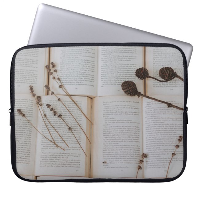 Dried flowers on books laptop sleeve (Front)