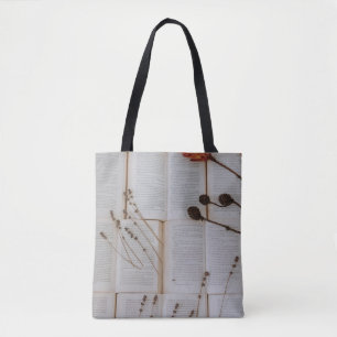 Dried flowers on books tote bag
