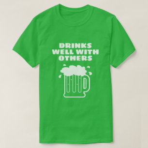 Drinks well with others - green St Patricks Day T-Shirt