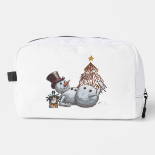 Drunk snowman with a bottle of whiskey. dopp kit