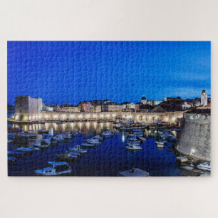 Dubrovnik harbour and walls illuminated at night jigsaw puzzle